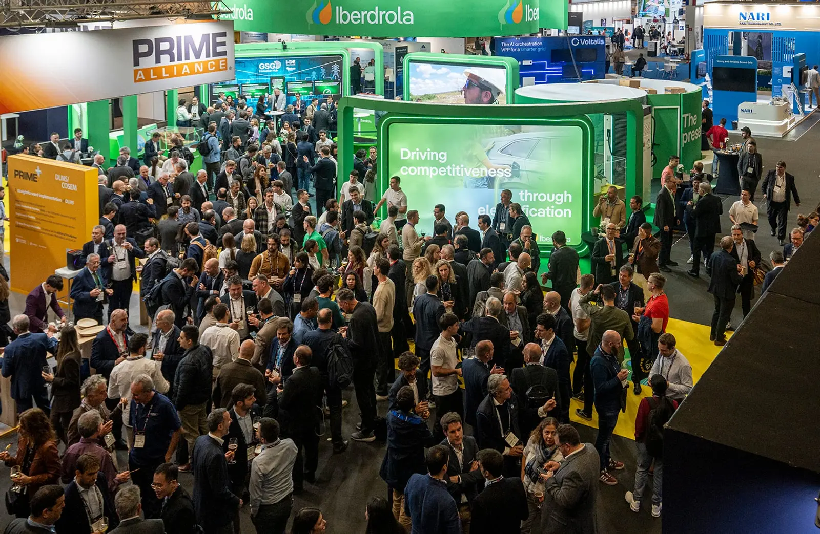 a large crowd of people at a convention